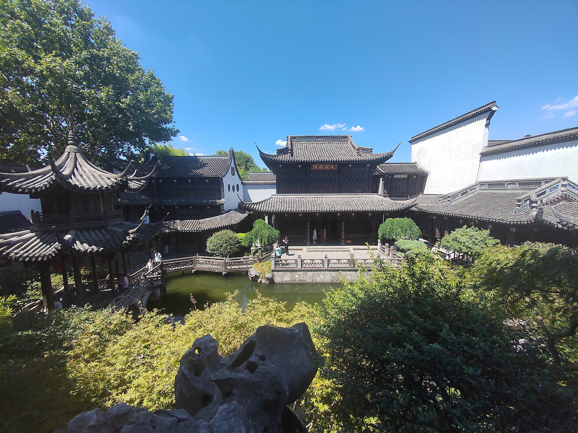 Garden halls and traditional rooflines at Hu Xueyan’s former residence